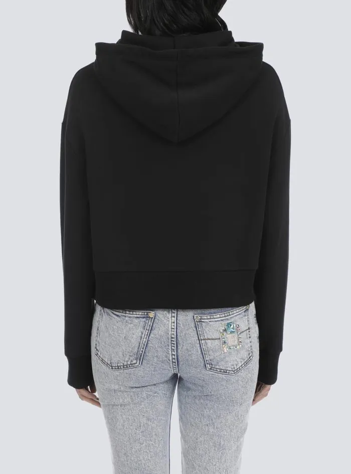Balmain Sweatshirts Women Cropped Ecodesigned Cotton Sweatshirt With Rhinestone Logo Black